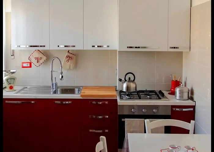 Domus Vacanze - Qui Staremo Bene Appartement